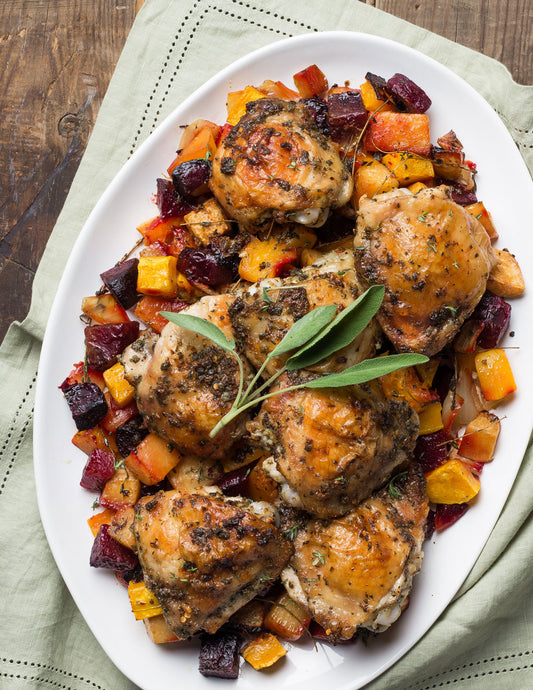 Chicken Thighs Over Root Vegetables image